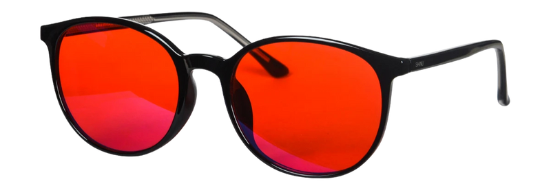 Sunglasses with red lenses and black frames on a white background